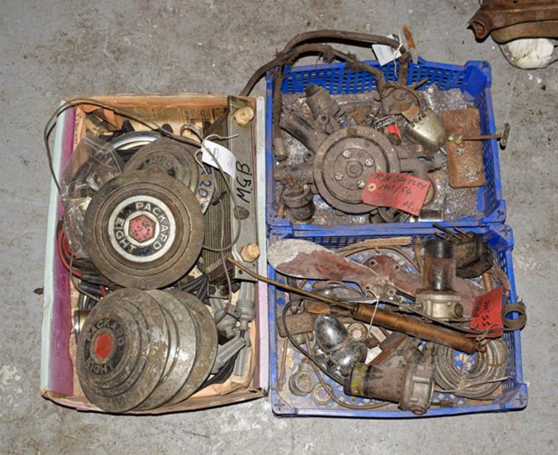 ~ Three Boxes of Assorted Car Spares, to include five Packard Eight wheel hubs, MGB spares, oil