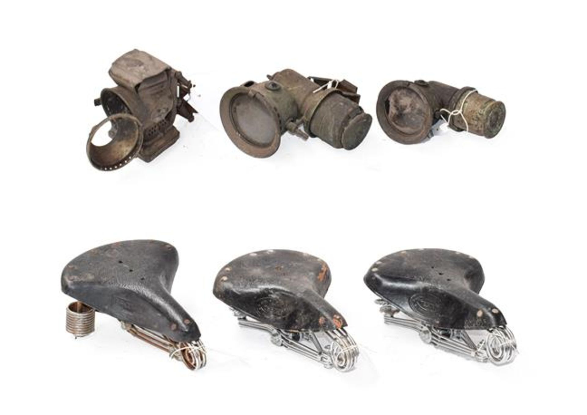 ~ Three Early 20th Century Carbide Bicycle Lamps; and Three Vintage Leather Motorcycle Seats,