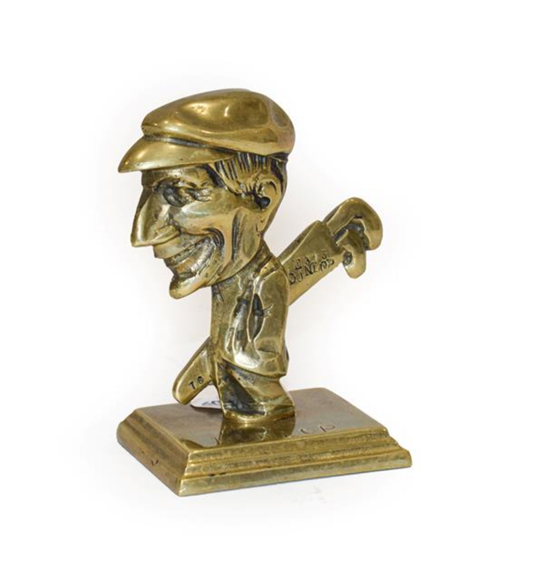 A Solid Brass Mascot, as a golfer carrying golf clubs, stamped Dunlop, the reverse stamped Reg Pat. - Image 2 of 2