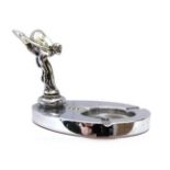 Rolls-Royce: A Chrome-Plated Ashtray, modelled as the Spirit of Ecstasy, mounted on an oval base