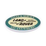 An Illuminated Car Display Sign: Land Rover Sales and Service Go Anywhere!, with low voltage