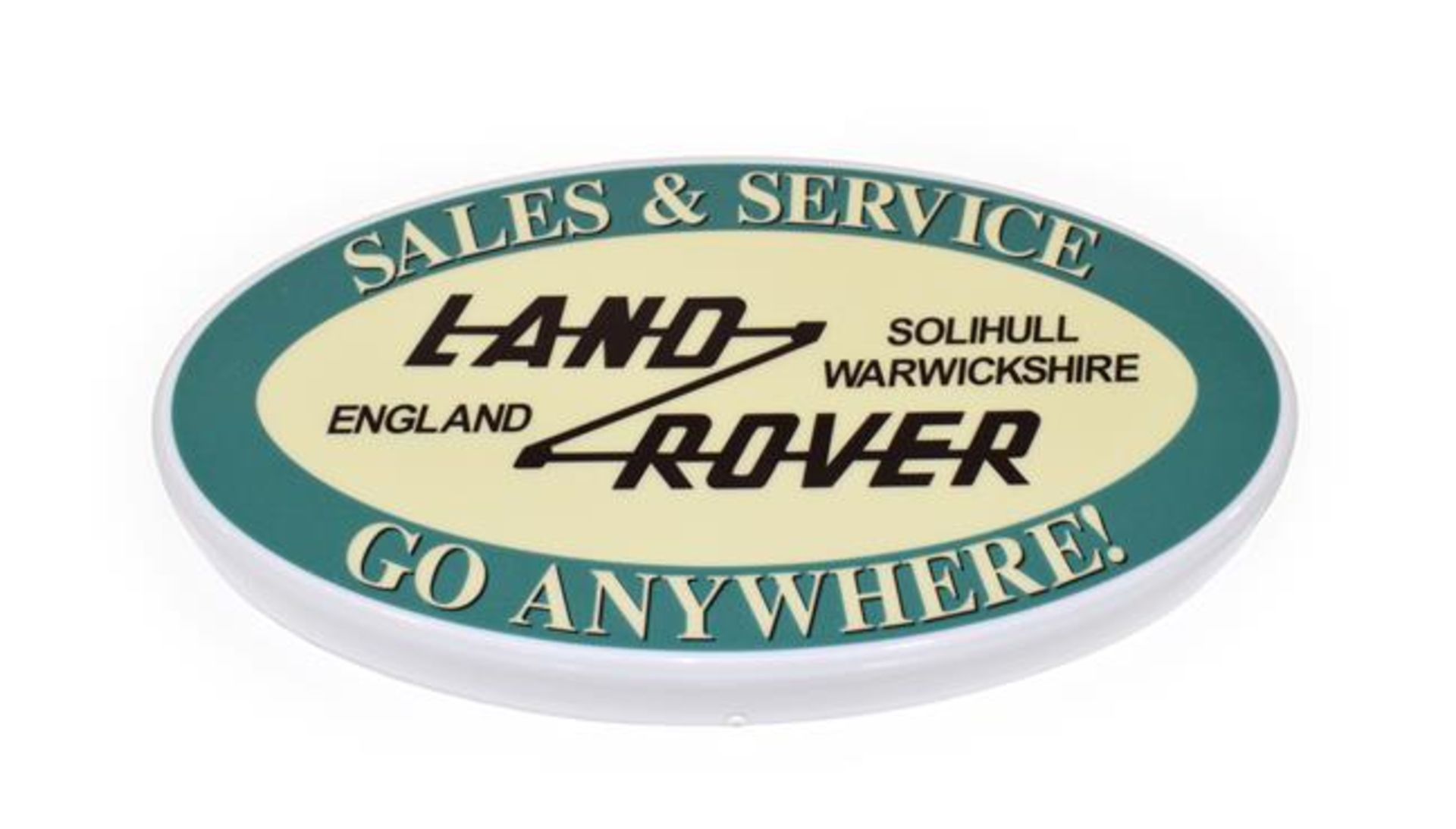 An Illuminated Car Display Sign: Land Rover Sales and Service Go Anywhere!, with low voltage