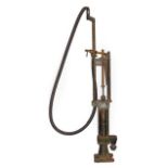 Wayne: A 1920/30 Brass Skeleton Petrol Pump, with rubber hose and brass filling tape, bearing