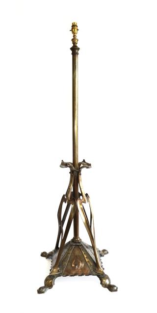An Art Nouveau Lacquered Copper Telescopic Standard Lamp, c.1910, on four supports, weighted base
