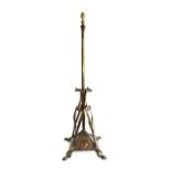 An Art Nouveau Lacquered Copper Telescopic Standard Lamp, c.1910, on four supports, weighted base