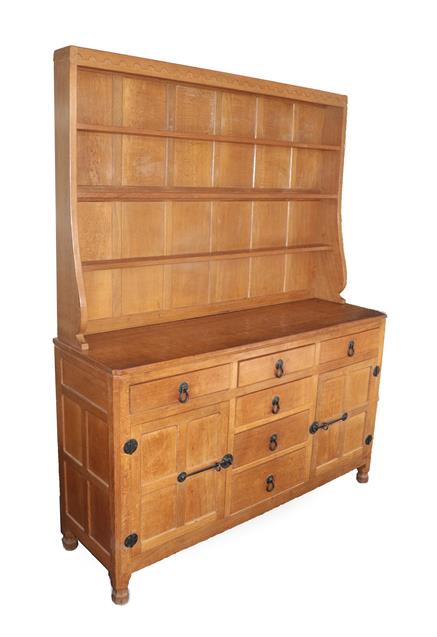 Workshop of Robert Mouseman Thompson (Kilburn): An English Oak Panelled 5ft Welsh Dresser, the