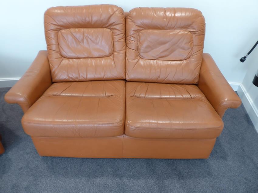 A Tetrad Brown Leather Sofa and Armchair, on brown castors, both labelled tetrad ENGLAND MAKERS OF - Image 5 of 26