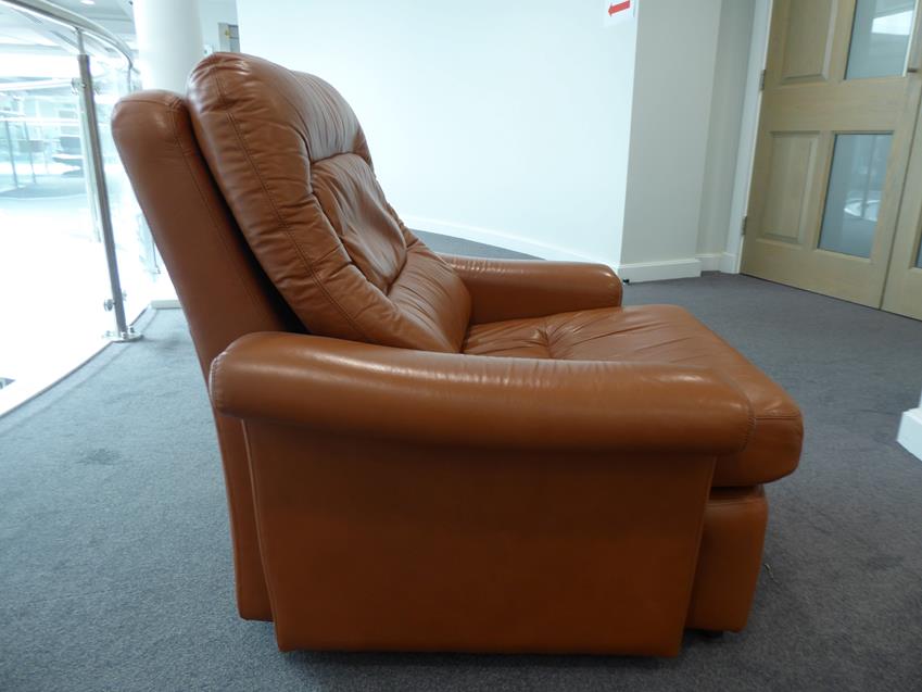 A Tetrad Brown Leather Sofa and Armchair, on brown castors, both labelled tetrad ENGLAND MAKERS OF - Image 21 of 26