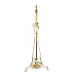 An Art Nouveau Brass Telescopic Standard Lamp, c.1910, on three whiplash supports, weighted base