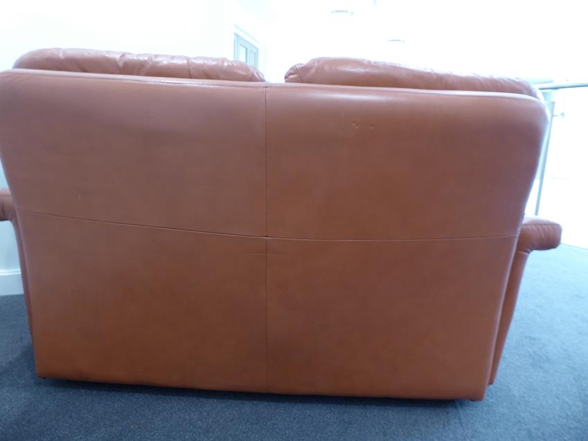A Tetrad Brown Leather Sofa and Armchair, on brown castors, both labelled tetrad ENGLAND MAKERS OF - Image 3 of 26