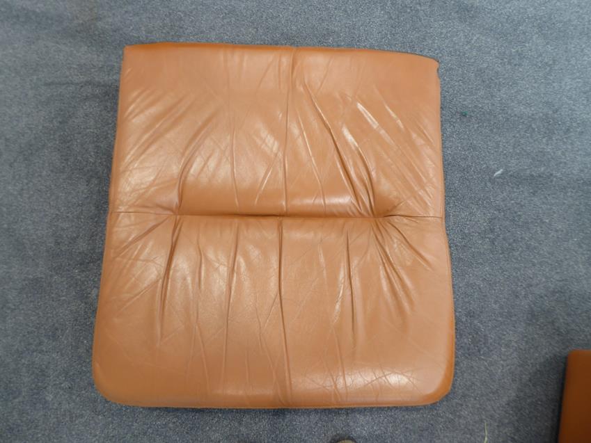 A Tetrad Brown Leather Sofa and Armchair, on brown castors, both labelled tetrad ENGLAND MAKERS OF - Image 25 of 26