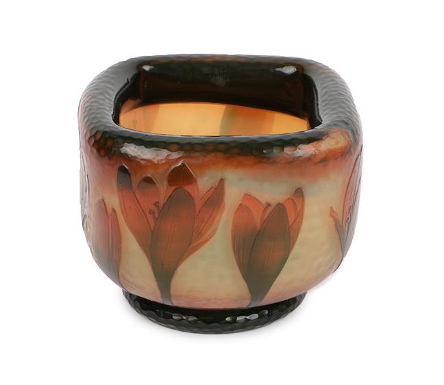 A Daum Nancy Cameo Glass Vase, circa 1900, folded over rim, cut with crocus in amber on a martelé