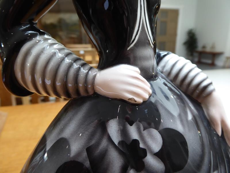 An Art Deco Goldscheider Pottery Figure, by Claire Weiss, modelled a woman wearing a floral black - Image 8 of 11