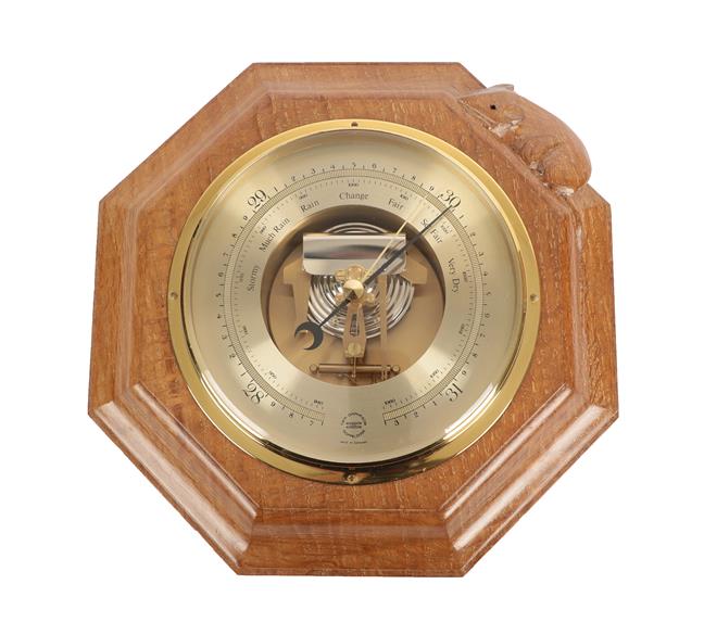 Workshop of Robert Mouseman Thompson (Kilburn): An English Oak Barometer, the octagonal frame