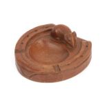 Robert Mouseman Thompson (1876-1955): An English Oak Horseshoe Ashtray, c.1940's/50's, with carved