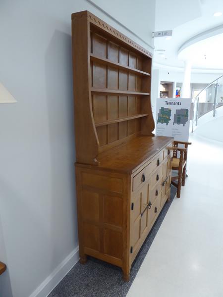 Workshop of Robert Mouseman Thompson (Kilburn): An English Oak Panelled 5ft Welsh Dresser, the - Image 9 of 23