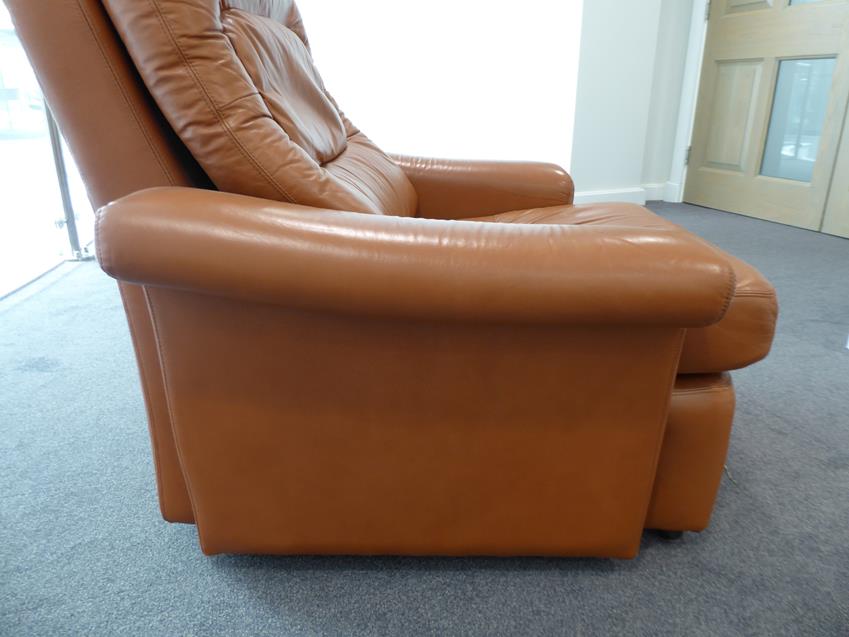 A Tetrad Brown Leather Sofa and Armchair, on brown castors, both labelled tetrad ENGLAND MAKERS OF - Image 20 of 26