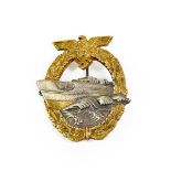 A German Third Reich E-Boat Badge, Second Pattern, in gilt metal with silver plated centre, the