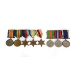 A First/Second World War Long Service Group of Eight Naval Medals, awarded to J.51800 I.CARR. A.B.