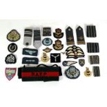 A Quantity of Post-Second World War RAF Insignia, including mohair cap bands, raised bullion