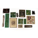 A Quantity of Militaria, including four small display boards of cap and collar badges and shoulder