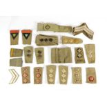 A Small Quantity of Mainly Second World War British Army Khaki Drill Insignia, including rank