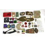 A Small Quantity of British Second World War and Post War, Cloth Insignia, including rank brassards,