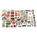 A Quantity of Post Second World War Cloth Insignia, mainly British and including rank stripes and