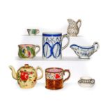 A tray of 18th century and later English pottery, including a pearlware tankard and sauce boat,