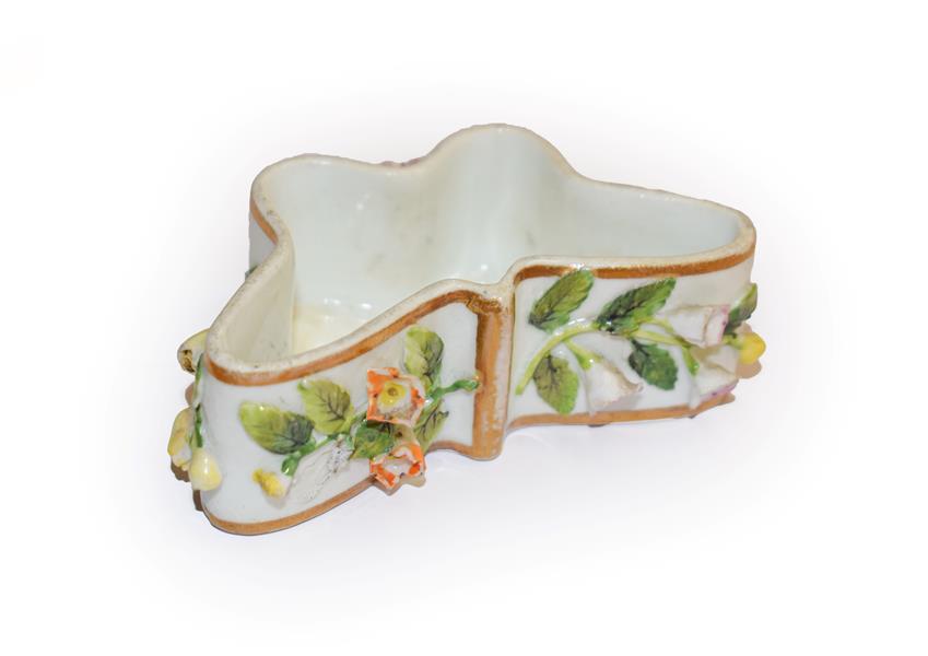 A Rockingham Porcelain 'Butterfly' box (lacking cover), decorated with applied Dresden flowers,