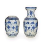 Pair of late 19th/early 20th century Chinese blue and white vases, decorated with figures in various