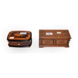 A modern Swiss cylinder music box in marquetry case, makers Reuge Music, playing the Magic Flute,