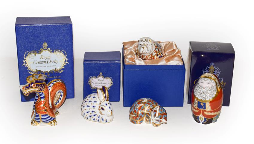 A Royal Crown Derby Imari paperweights, Sleeping Cat, Bull dog, Duck, Santa Claus and a Rabbit,