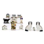 A collection of 19th century Staffordshire pottery including a pearlware figure titled Rural, pair