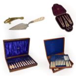 A cased set of silver plated fish knives and forks, another set of fruit knives and forks, a