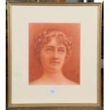 A pastel portrait of a young lady, monogrammed M P 1897, 29cm by 24cm