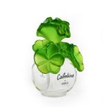 A Cabotine de Gres Oversized Perfume-Bottle, with green foliage stopper, 23cm high