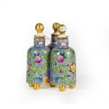 A Ceramic Three Section Scent-Bottle, each of the three bottles on ball feet, the sides painted with
