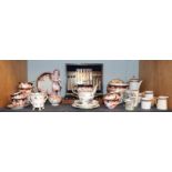 A collection of 19th/20th century ceramics, including a German porcelain figure of a merchant, a