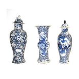 Two 19th century Chinese blue and white vases and a later decorative example (3). Vase one: Restored