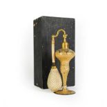 A Gilt-Metal Mounted Gilt Glass Atomiser bottle, baluster and on spreading foot, in cardboard box,