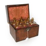 A 19th century mahogany cased set of six square decanters with stoppers, plus key. Case with