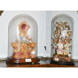 A pair of Victorian bisque figures under glass dome, together with a pocket watch stand under