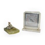 An Art Deco alabaster desk top barometer, together with a cold painted bronze terrier group