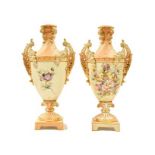 A pair of blush ivory twin-handled Rudolstadt vases (lacking covers, 36cm) (2)