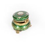 A Gilt-Metal and Enamel Box, bombe circular, overall enameled in green and decorated with putto