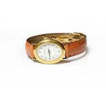 A ladies oval shaped 18ct gold wristwatch, signed Moroni, case back stamped with convention mark