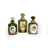 Three Differing Green Glass Scent-Bottles, each cylindrical and with gilt heightened decoration,