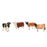 Four Beswick cows (a.f) (4)