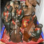 A painted resin six piece jazz band: a pianist, drummer, cellist, trumpeter, saxophonist and singer,
